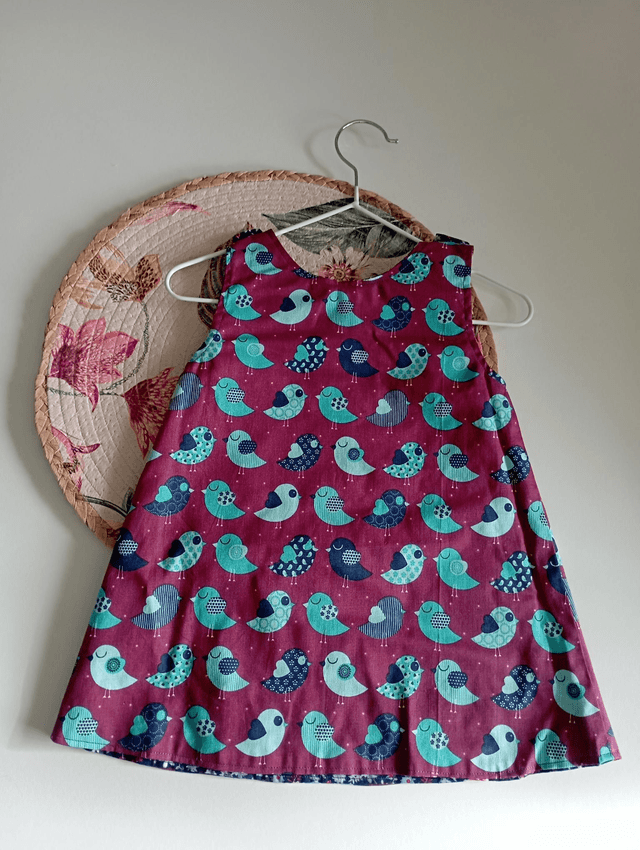 Robe réversible taille 9-12 mois.