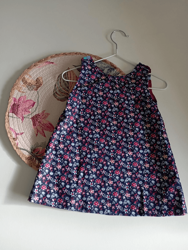 Robe réversible taille 9-12 mois.